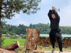This handout photo taken on June 21, 2019 and received on June 26, 2020 courtesy of Genichi Mitsuhashi shows his ninja training in Iga, Mie prefecture. 
