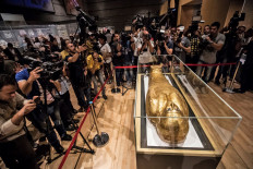 A picture taken on October 1, 2019, shows the Golden Coffin of Nedjemankh, on display at the National Museum of Egyptian Civilization in Cairo, following its repatriation from the US.