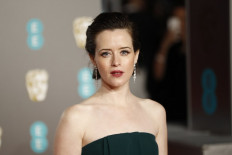 British actress Claire Foy poses on the red carpet upon arrival at the BAFTA British Academy Film Awards at the Royal Albert Hall in London on February 10, 2019.