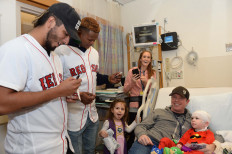 Boston Red Sox rookies (left to right) Jonathan Arauz, and Yoan Aybar visit with Carter and family at Boston Children's Hospital Jan. 15 in Boston, Massachusetts. A recent study, led by Boston Children's Hospital, found 186 cases of Multisystem Inflammatory Syndrome in Children (MIS-C) in 26 US states, with 4 out of 5 cases needing intensive care and one out of five requiring mechanical ventilation. Four patients died.