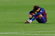 Barcelona's Riqui Puig looks dejected after a match between Barcelona and Atletico Madrid at Camp Nou, Barcelona, Spain on June 30, 2020 , as play resumes behind closed doors following the outbreak of the COVID-19.  