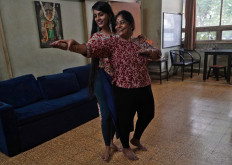 Geetha Sridhar, 54, who used to post over a dozen videos on video-sharing app TikTok, and her daughter Sarada Sridhar dance as they make a video that they said will upload on an Indian app, after India banned dozens of Chinese apps including TikTok following a border clash between the two nations, inside their house in Mumbai, India, on July 1, 2020. 