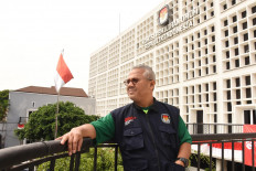 General Elections Commission (KPU) chief Arief Budiman stands in front of the Indonesian poll body's office in Jakarta on July 3. 
