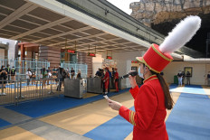 Tourist attractions in Singapore reopen to cautious crowds