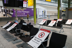 Seats marked to help with social distancing are pictured inside Terminal 5 at Heathrow airport in west London as the UK government's planned 14-day quarantine for international arrivals to limit the spread of COVID-19 starts on June 8, 2020.
