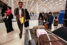 Yemeni children and their guardians arrive after a United Nations medical evacuation from Sanaa at Queen Alia International Airport, south of the Jordanian capital Amman, on February 3, 2020, in what the UN hopes will be the first of many 'mercy flights'. 