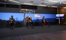 Formula One F1 - Austrian Grand Prix - Red Bull Ring, Spielberg, Styria, Austria - July 4, 2020   Mercedes' Valtteri Bottas and Lewis Hamilton with Red Bull's Max Verstappen wearing protective face masks during the press conference after qualifying, as F1 resumes following the outbreak of the coronavirus disease (COVID-19)   