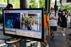 Karaoke cluster blamed for COVID-19 cases spike in Singapore  