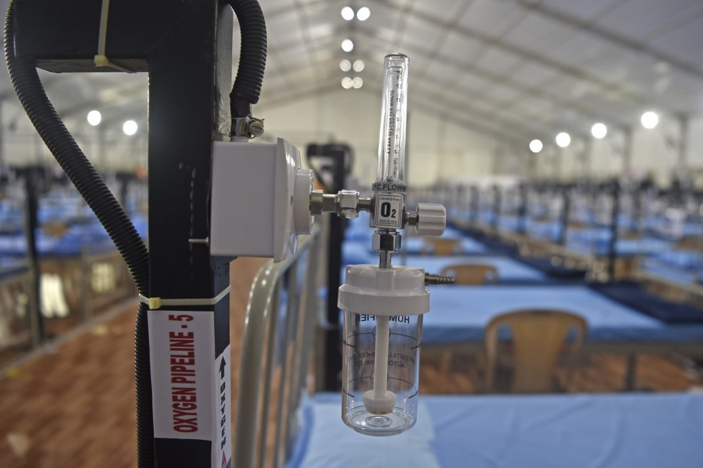A medical equipment attached to a bed is pictured inside a newly built hospital to treat COVID-19 coronavirus patients at the Mahalaxmi Racecourse, in Mumbai on July 7, 2020.Young people who are hitting nightclubs and beaches are leading a rise in fresh coronavirus cases across the world, with the proportion of those aged 15 to 24 who are infected rising three-fold in about five months, the World Health Organization said.