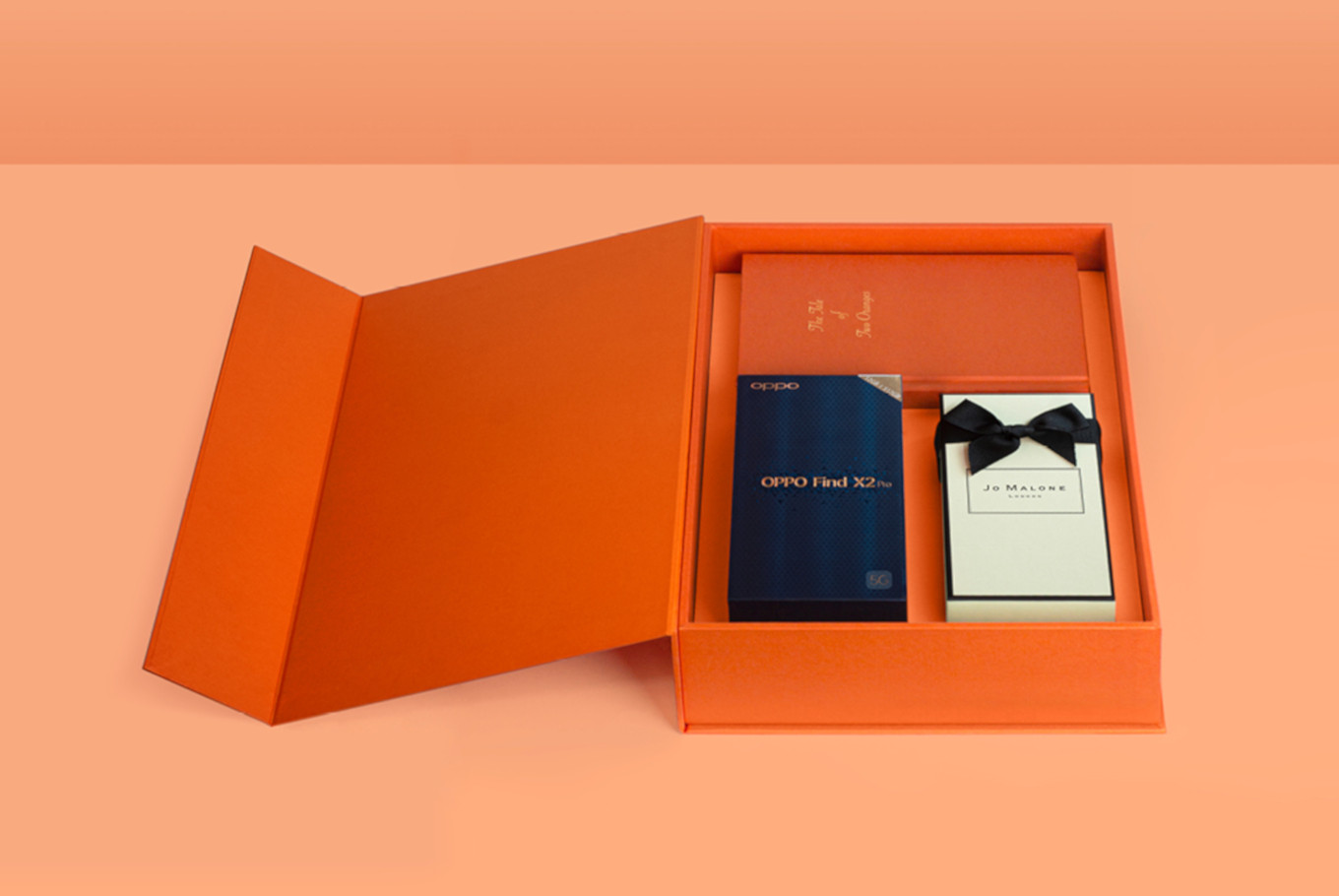 The OPPO x Jo Malone London package includes the Tea Orange version of the OPPO Find X2 Pro, a 100 ml bottle of Orange Bitters fragrance, earphones, an adapter and SIM ejecting tool. 