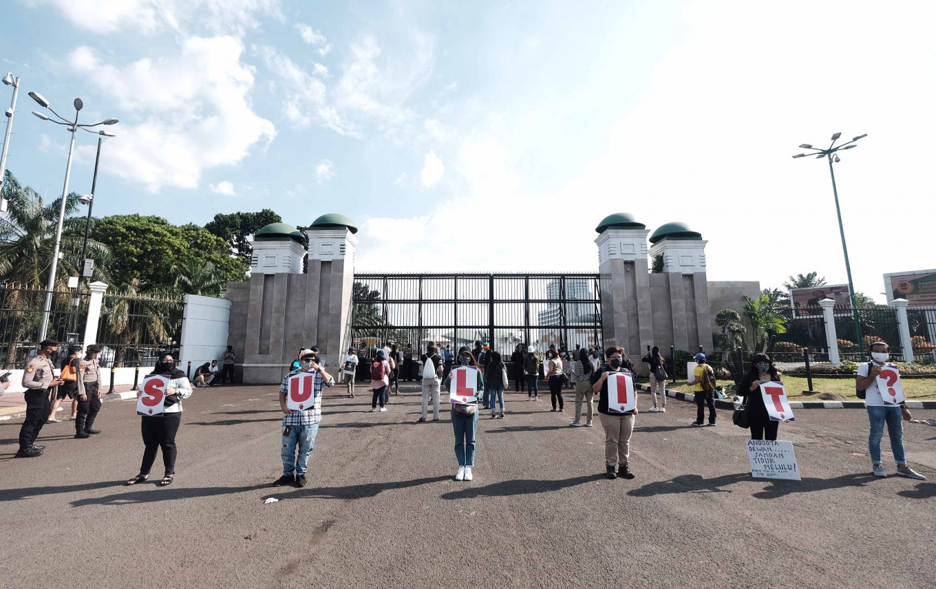 Female voice: Women’s rights activists stage a protest in front of the House of Representatives compound in Jakarta, on Tuesday, to express their support for the sexual violence eradication bill, which has not been deliberated since 2016 while cases of sexual violence continue to mount. The activists will stage similar actions on coming Tuesdays.