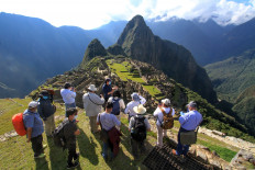 Members of a commission of authorities and experts led by the the Governor of Cusco, Jean Paul Benavente, visit the Inca citadel of Machu Picchu on June 12, 2020, assessing the new health and distancing protocols in order to reopen to the public on July 1.
