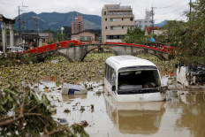 Rain pounds central Japan, 55 feared dead in south