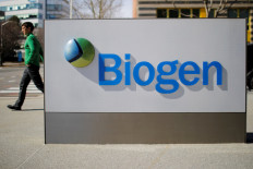 A sign marks a Biogen facility., March 9, 2020.