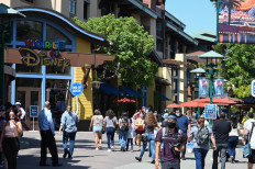 California theme parks remain shut but hundreds flock to Disney shops