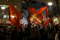 Singapore ruling party's support slips in pandemic poll