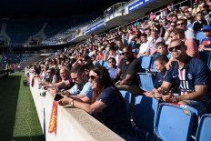 Supporters, attend for the start of the Friendly football match between Le Havre Athletic Club and Paris Saint-Germain at the Stade Oceane, in Le Havre, on July 12, 2020. - Le Havre Athletic Club and Paris Saint-Germain is the first match of the Parisian club and the first with supporters since the interruption of the season due to the COVID-19 pandemic.