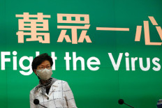 Hong Kong Chief Executive Carrie Lam, wearing a protective mask, speaks during a news conference over global outbreak of the coronavirus disease (COVID-19) in Hong Kong, China July 13, 2020. 