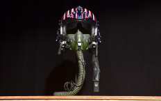 Items up for auction at the Prop Store Auction in late August are on display at the Prop Store in Valencia, California on July 15, 2020 include the helmet worn by actor Tom Cruise in the movie 'Top Gun', estimated at $50,000 to $70,000. 
