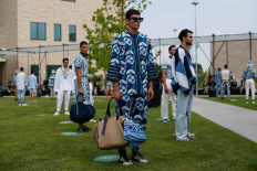 Masks and social distancing at Dolce & Gabbana's first COVID-era catwalk