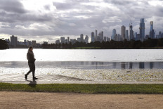 Australia warns coronavirus outbreak will take weeks to tame