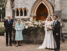 In a handout picture released by Buckingham Palace on July 18, 2020 Britain's Princess Beatrice of York (2R), her husband Edoardo Mapelli Mozzi (R), pose with Britain's Queen Elizabeth II (2L) and Britain's Prince Philip, Duke of Edinburgh (L) outside The Royal Chapel of All Saints at Royal Lodge, Windsor, west of London, on July 17, 2020 after their marriage ceremony. 