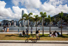 Will Hong Kong become like tightly-ruled but stable Singapore? 			
