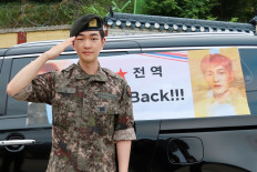 SHINee’s Onew returns from military service