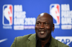Former NBA star and owner of Charlotte Hornets team Michael Jordan looks on as he addresses a press conference ahead of the NBA basketball match between Milwaukee Bucks and Charlotte Hornets at The AccorHotels Arena in Paris on January 24, 2020.