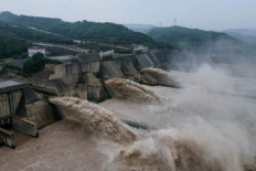 China blows up dam in eastern province to ease flood risk