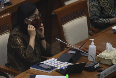 Grappling with bureaucracy, new ministers struggle to spend money fast enough: Sri Mulyani