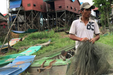 Fishermen without fish as Cambodia's river reversal runs late