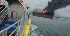 Passengers, crew rescued after cargo ship catches fire in Java Sea