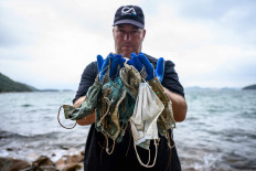 Single-use masks, coronavirus waste end up polluting ocean