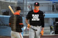 Hunter Pence #8 of the San Francisco Giants looks on during batting practice before the Opening Day game against the Los Angeles Dodgers at Dodger Stadium on July 23, 2020 in Los Angeles, California. The 2020 season had been postponed since March due to the COVID-19 pandemic. 