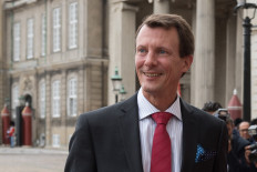 This file photo taken on August 28, 2018 shows Prince Joachim of Denmark arriving at the Amalienborg Castle in central Copenhagen. 