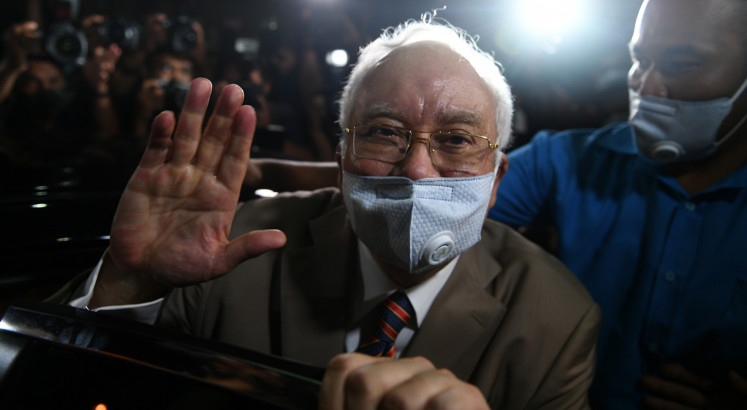 Former Malaysian PM Najib Razak sentenced to 12 years in prison for 1MDB graft
