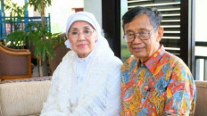 Back home: Two-time Citra Award winner Nani Wijaya (left) sits beside her husband, poet and writer Ajip Rosidi, in this undated photograph.