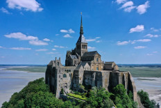 An aerial photograph taken on May 26, 2020 shows the Mont Saint-Michel Abbey, in Normandy, northwestern France. Since 1979, the site of the Mont Saint-Michel and its bay is a UNESCO world heritage site.