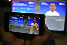 Dedy Permadi, PhD, special advisor to the Minister of Communications and Informatics for digital policy and human resource development speeches in Jak Post Up Close Webinar titled Personal data protection and the rise of digital platforms in Jakarta on Thursday, July 30. 2020. There also Carmela Acevedo, Google senior software engineer, Shinto Nugroho, Gojek chief of public policy and government relations, Wahyudi Djafar, ELSAM research director as speakers and hosted by Marguerite Afra Sapiie, The Jakarta Post editor. JP/Wienda Parwitasari

