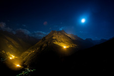 Swiss mountains light up in a national day celebration to suit COVID-19 era