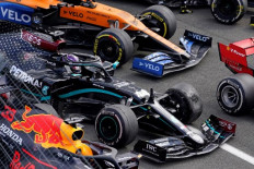 The punctured tire of Mercedes' British driver Lewis Hamilton's car is pictured after he won the Formula One British Grand Prix at the Silverstone motor racing circuit in Silverstone, central England on Aug. 2, 2020. - Lewis Hamilton survived a dramatic finale to win the British Grand Prix on Sunday, just making it across the line on three tires to beat a fast closing Max Verstappen on Red Bull. The defending world champion claimed his seventh British Grand Prix win as Ferarri's Charles Leclerc came third and Daniel Ricciardo of Renault fourth. 