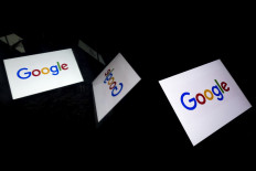 Google signs copyright agreements with six French newspapers