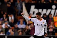 In this file photo taken on November 30, 2019 Valencia's Spanish midfielder Ferran Torres celebrates after scoring during the Spanish league football match between Valencia CF and Villarreal CF at the Mestalla stadium in Valencia.Valencia have been hit by two positive cases for coronavirus, the La Liga club announced on Tuesday, a day after players and staff returned for pre-season.