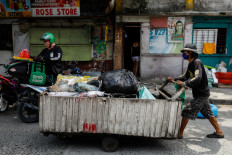 Philippine trash trawlers earn little from virus-boosted surge in plastics