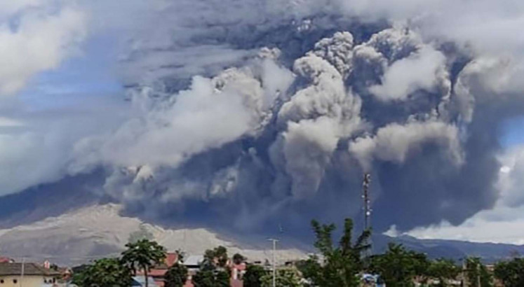 Mount Sinabung blasts tower of smoke and ash into sky