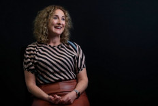 This photo taken on August 6, 2020 shows New Zealand media mogul Sinead Boucher speaking while posing at the headquarters of Stuff media in Wellington. - Tucked away in Sinead Boucher's sock drawer is the one-dollar coin that transformed the former journalist into New Zealand's biggest media mogul, giving her a platform to challenge Facebook and other social media giants. 