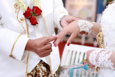 Police break up W. Sumatra wedding reception, citing protocol violation