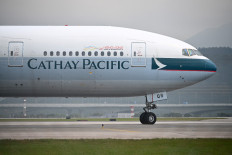  Cathay Pacific says crews spent 73,000 nights in quarantine in 2021 