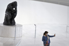 Virus-hit Mexico City reopens museums, cinemas